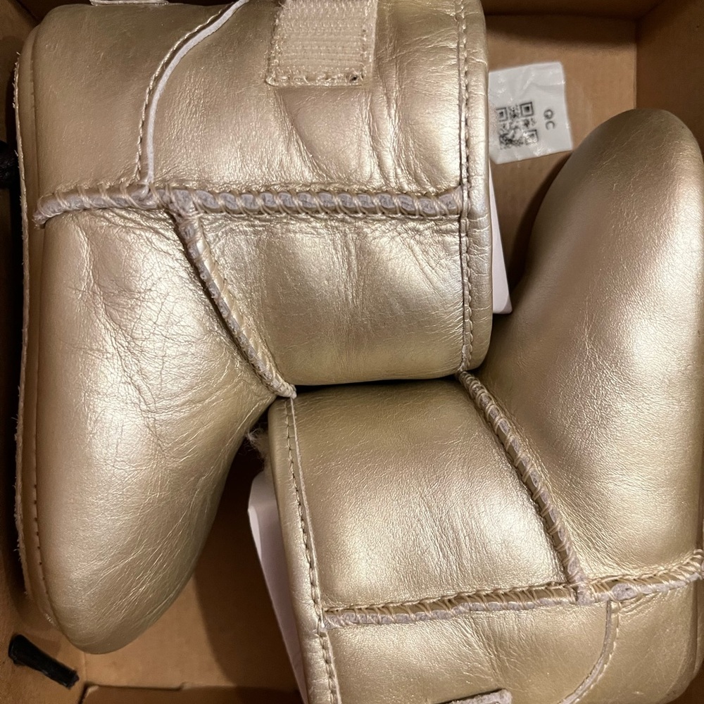 Gold Ugg booties for Infants